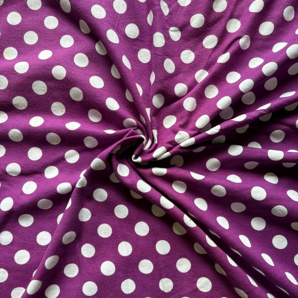 Purple Polka Dots in Flannel fabric for customised night suits and classic winter loungewear.