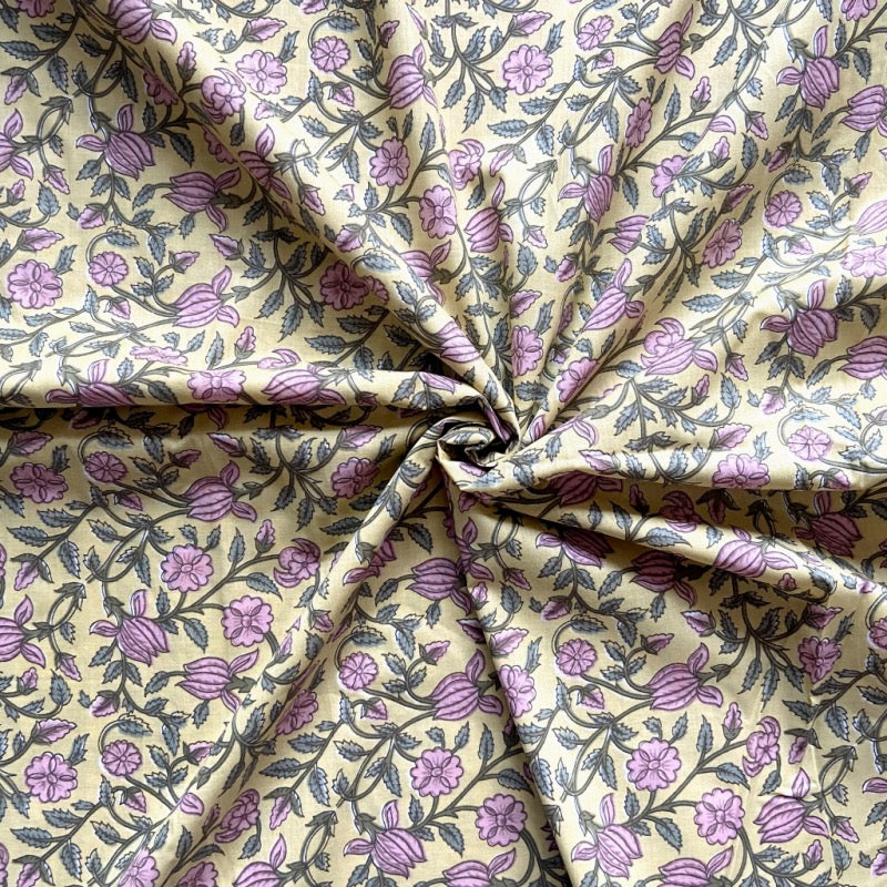Yellow blossom Jaipuri cotton fabric for floral night suits, festive lounging and summer sleepwear.