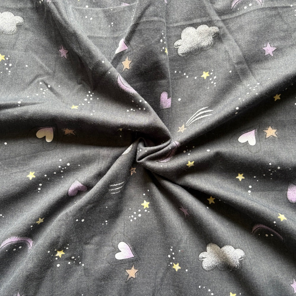 Starry Night Print in Flannel fabric for space-themed night suits and warm kids’ loungewear.