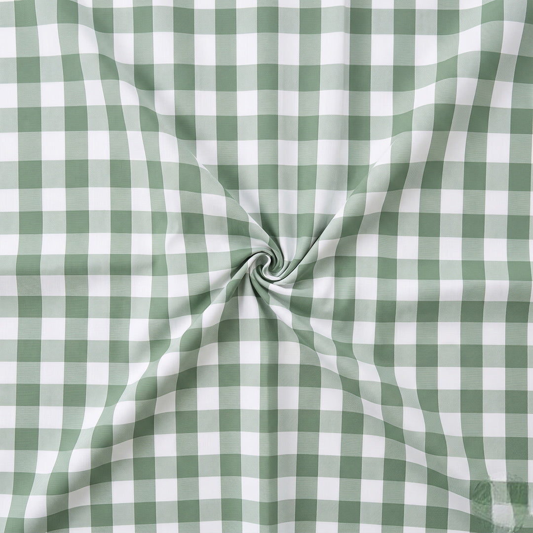 Green and white checkered fabric with a swirl pattern
