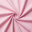 Pink gingham fabric in a swirl pattern