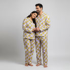 Gingham check couple nightwear with floral accents in his and her pajamas