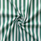 Green and white striped fabric in a swirl pattern