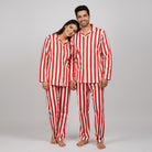 Bold red stripe couple night suit styled as confident matching pajamas
