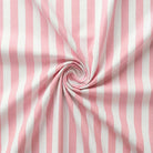 Pink and white striped fabric in a swirl pattern