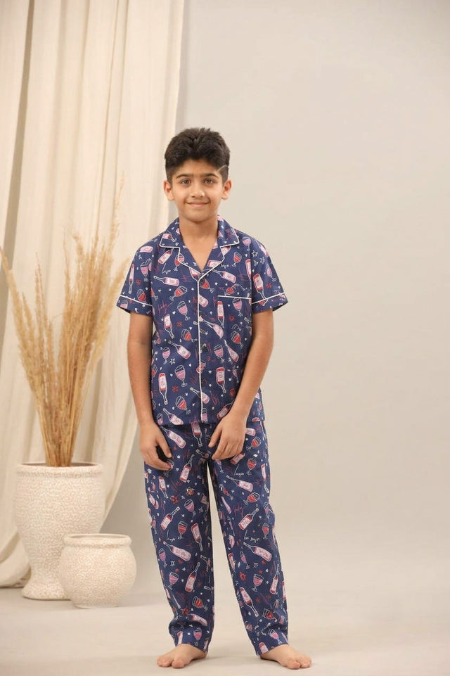 Boy wearing celebrations print pajama set