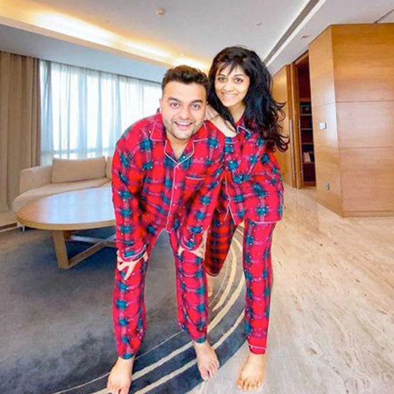 Couple in matching Christmas nightwear