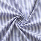Lavender and white striped fabric in a swirl pattern