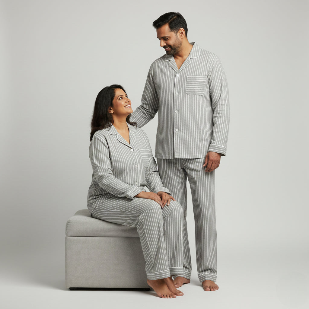 Matching couple cotton pajamas in cool grey stripe design.