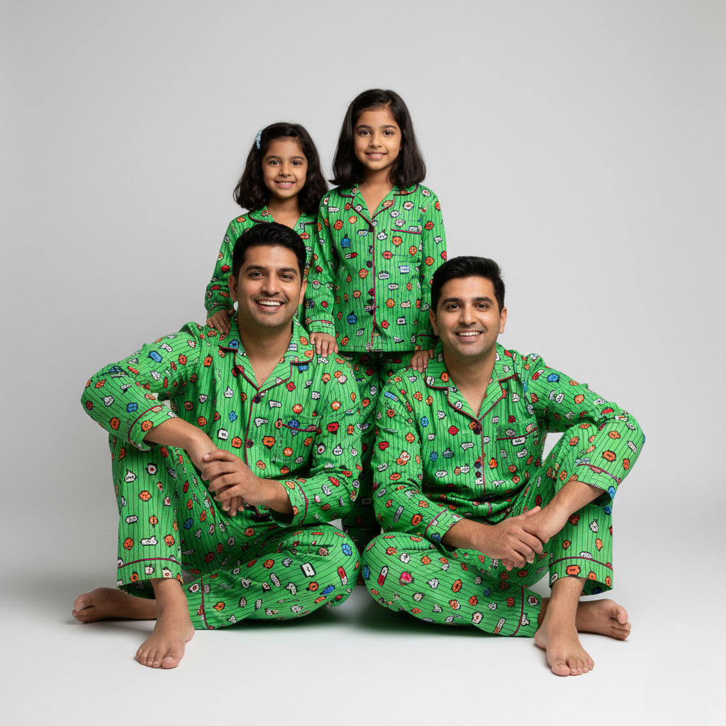 Family wearing emoji print matching pajamas, playful bright coordinated set.
