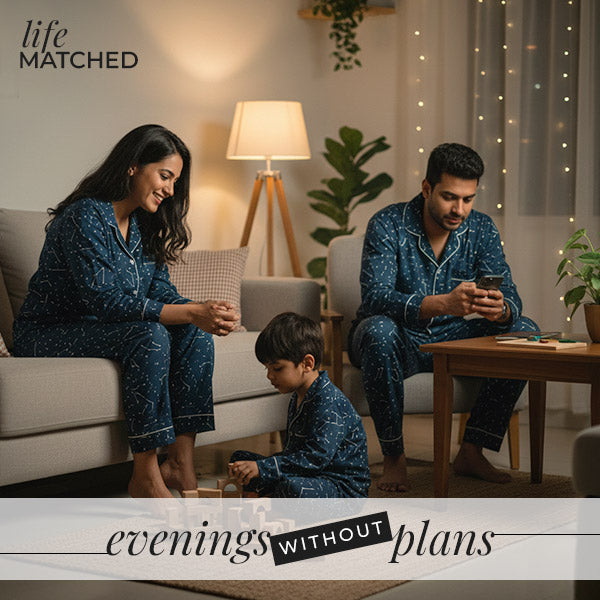 Family spending a quiet evening at home in matching cotton pajamas, sharing unplanned moments together