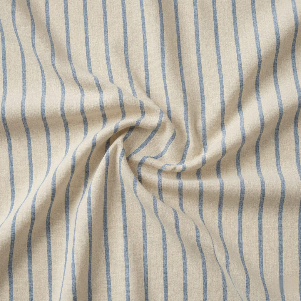 Ivory cream cotton fabric with soft blue stripes