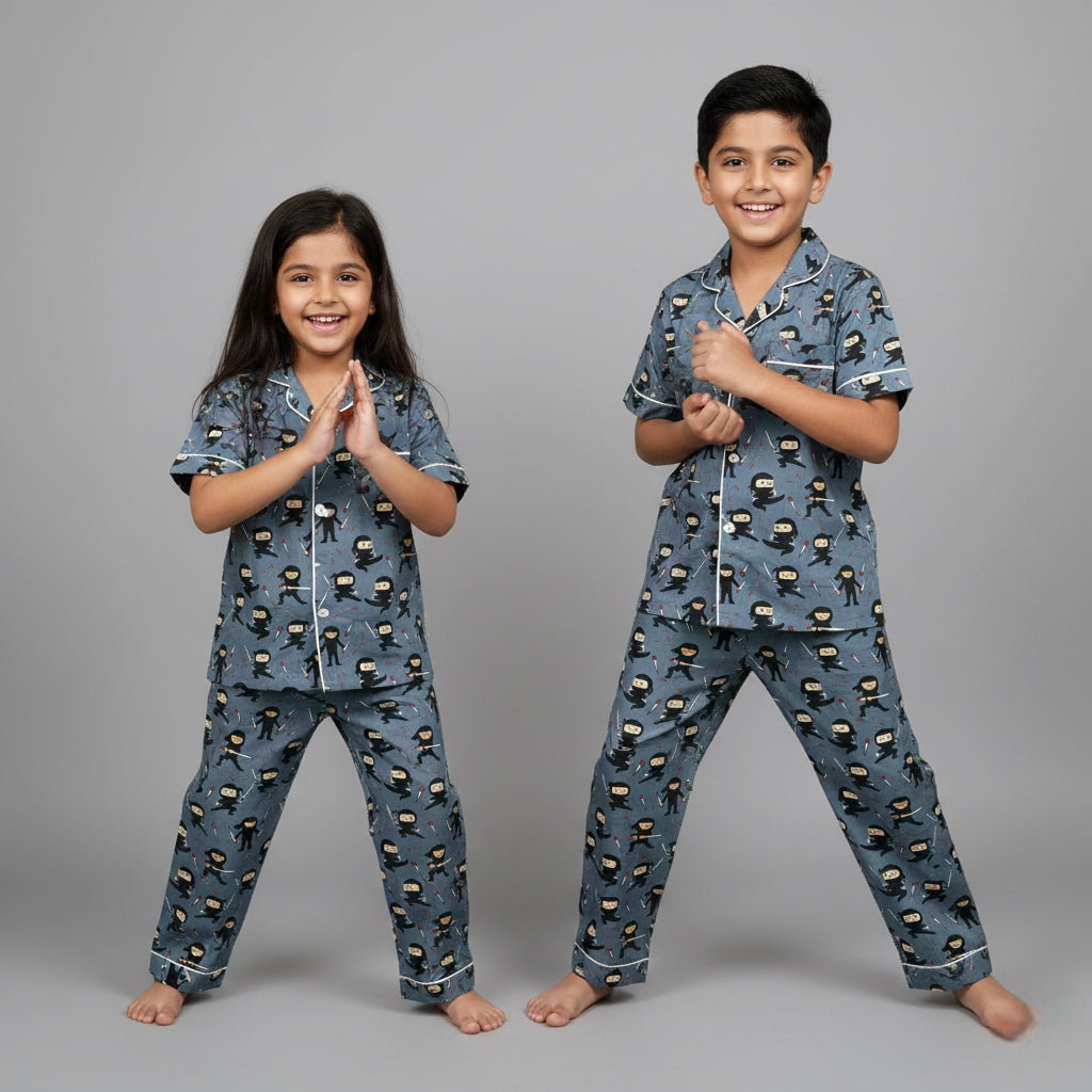 Brother and sister wearing Karate Kid matching pajamas, action-themed coordinated print.