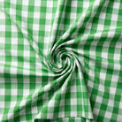 Green and white checkered fabric in a swirl pattern