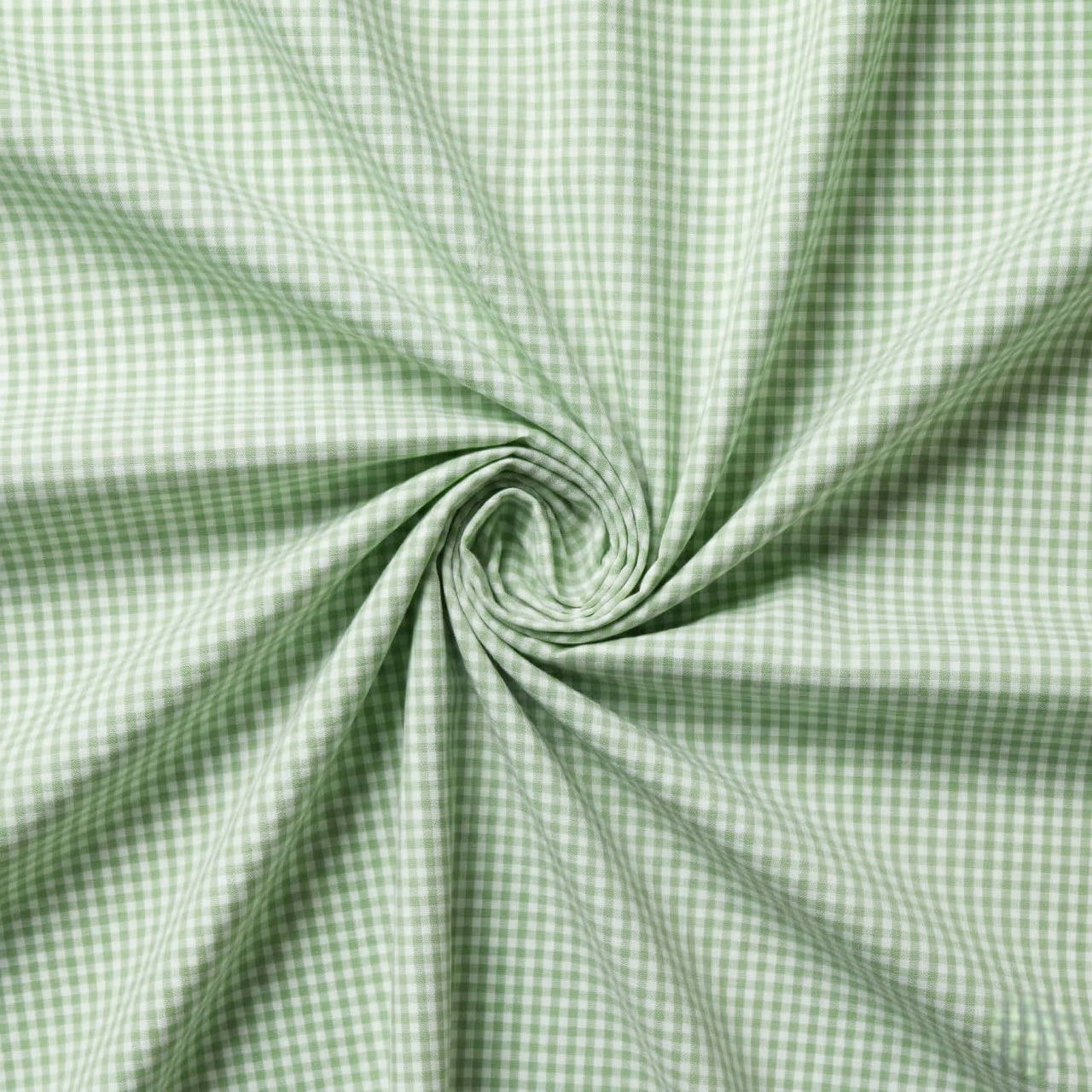 Green and white checkered fabric in a swirl pattern