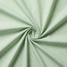 Green and white checkered fabric in a swirl pattern
