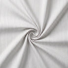 Close-up of gray striped fabric with a swirl pattern