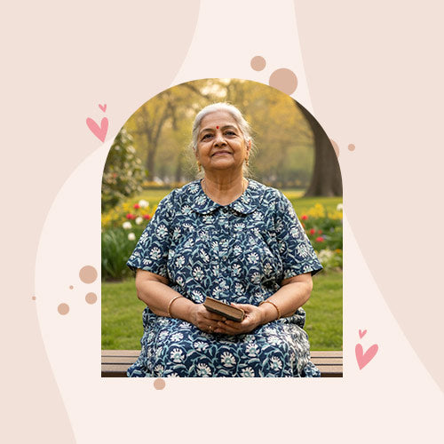 Woman in a floral plus size night gown holding a book in a park