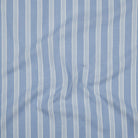 Powder blue cotton fabric with white stripe pattern