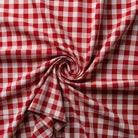 Red and white checkered fabric with a swirl pattern
