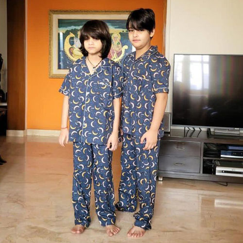 Brothers wearing same pajama sets