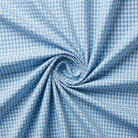 Blue and white checkered fabric in a swirl pattern