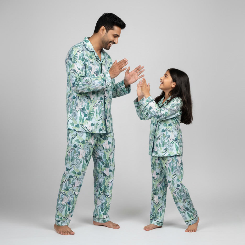 Father and daughter in Tropical Garden matching pajama set, floral coordinated nightwear.