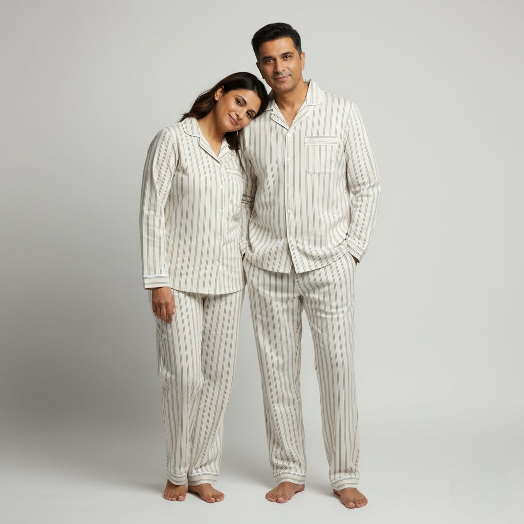 Matching couple cotton sleep set in warm ivory with charcoal stripes.