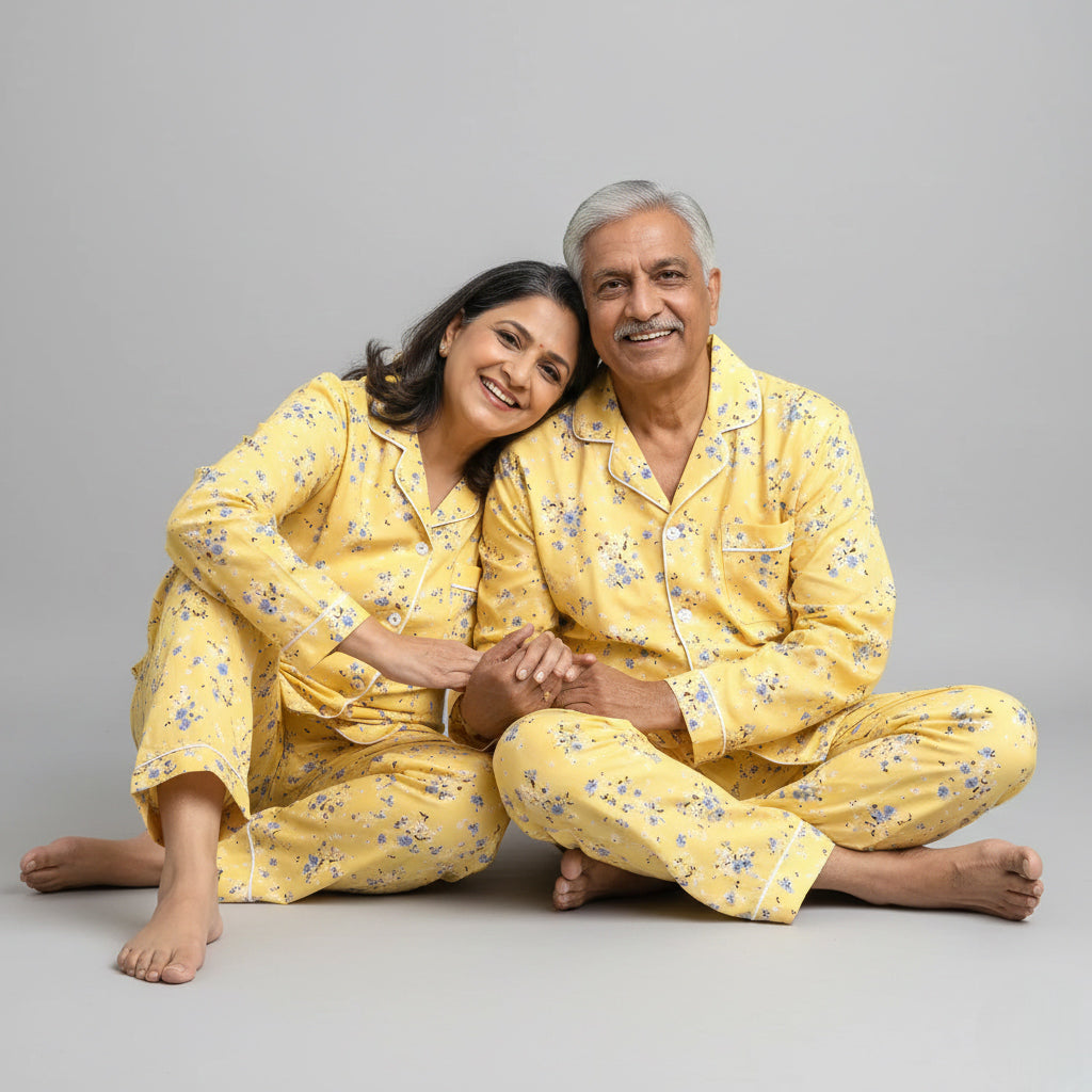 Elderly couple in yellow floral matching pajama set, bright coordinated print.