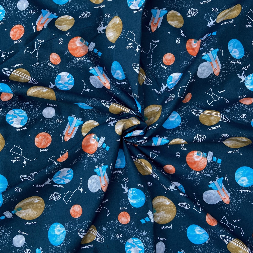 Solar System cotton fabric for space-themed night suits, kids’ pajamas and science-loving sleepwear.