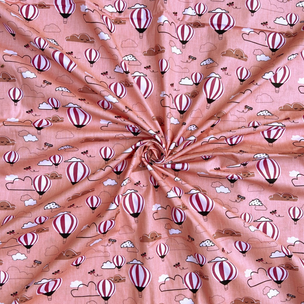 Hot Air Balloon in the Clouds cotton fabric for travel-themed night suits and dreamy kids’ sleepwear.