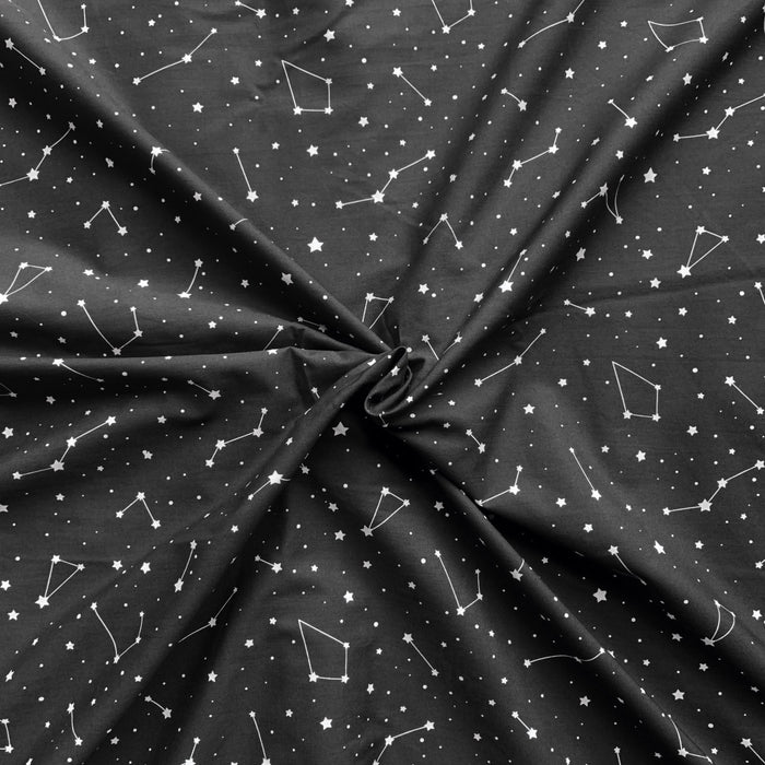Constellation cotton fabric for starry night suits, kids’ space sleepwear and bedtime stories.